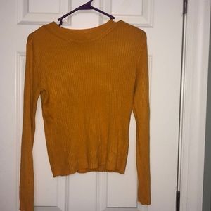 mustard colored sweater